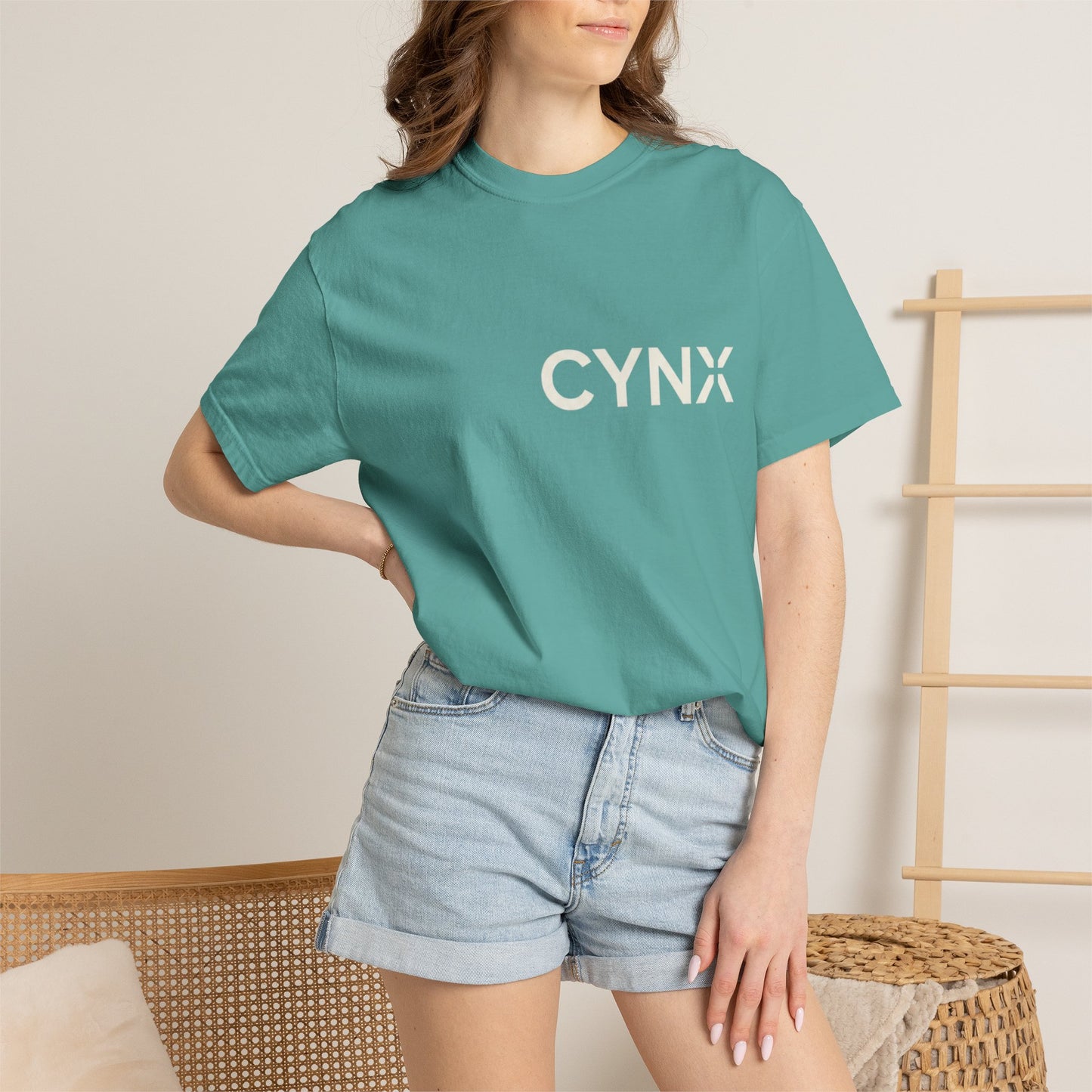 Peace Dove T‑Shirt — ‘CYNX’ Front Logo, Blue Dove Back with Repeating “Peace” Circle
